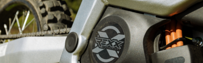 Close-up of a dirt bike with Teryx branding on a natural background